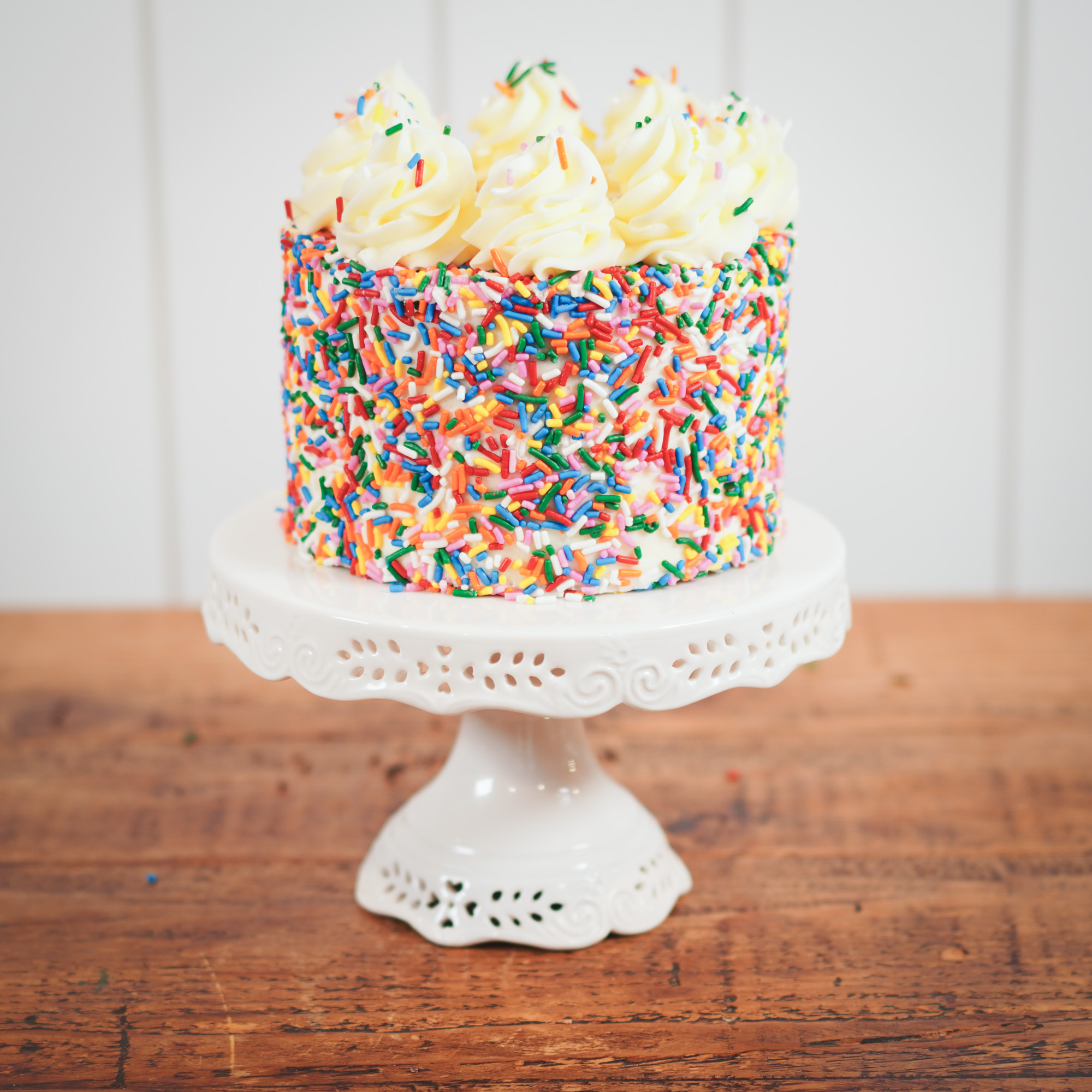 rainbow sprinkles with buttercream swirl